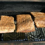 Place the 3 pieces of brisket in the smoker box