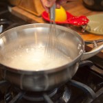 Stir the sugar and water. If the water is still cloudy like this, you need to stir more. Stir the sugar and water. If the water is still cloudy like this, you need to stir more.
