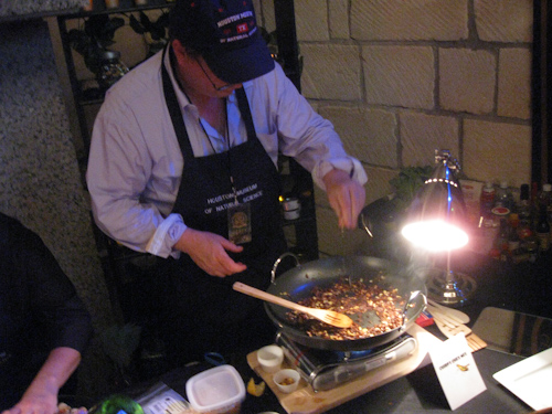 Chef cooking up some edible crickets Chef cooking up some edible crickets