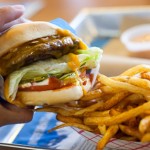 Elevation Burger with fries and Elevation sauce on the side
